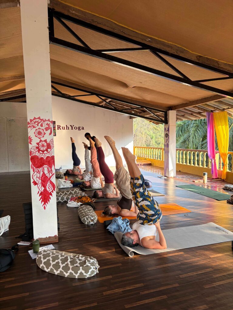 Students practising during Yoga Teacher Training