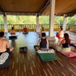 students practising yoga