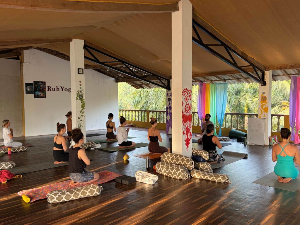 Yoga Teacher Training students practising yoga in Goa